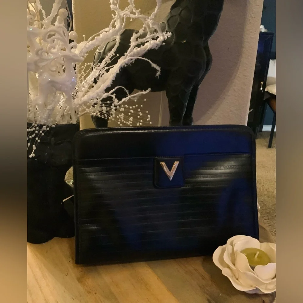 VGT Mario Valentino authentic. Black classy clutch/purse Gold Detail “Host Pick”